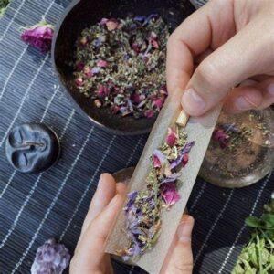 Rolling Lavender to use as a smokable herbs.